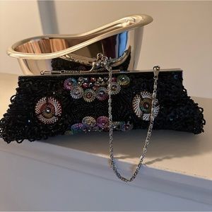 Sequence black clutch handbag, clutch or shoulder chain one of a kind.